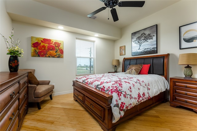 bedroom featuring light hardwood / wood-style floors and ceiling fan