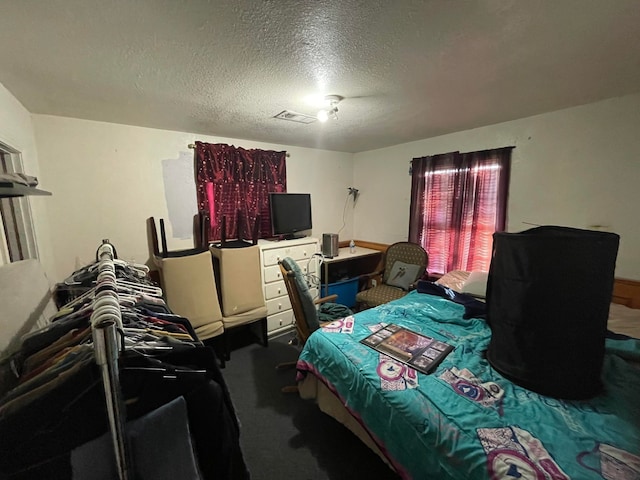 bedroom with a textured ceiling