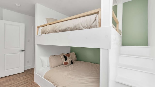 bedroom with light hardwood / wood-style floors