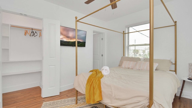 bedroom featuring ceiling fan and light hardwood / wood-style flooring