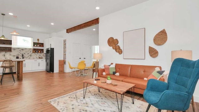 living room with light hardwood / wood-style flooring