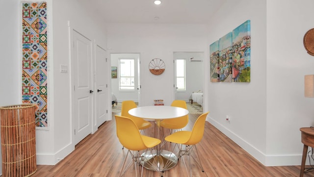 dining room featuring light wood-type flooring