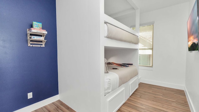 bedroom featuring light wood-type flooring