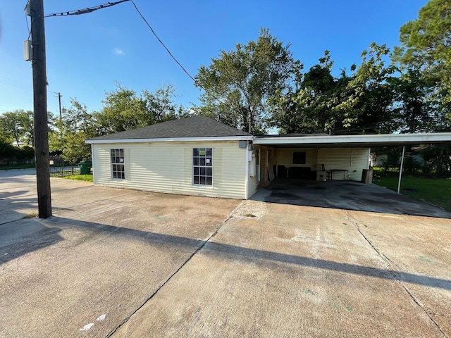 view of front of home with a carport