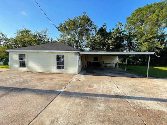 view of front of property with a carport