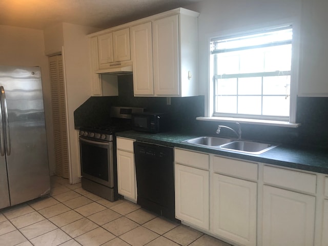 kitchen featuring white cabinetry, light tile floors, black appliances, backsplash, and sink