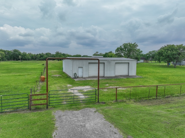 exterior space with a lawn and a garage