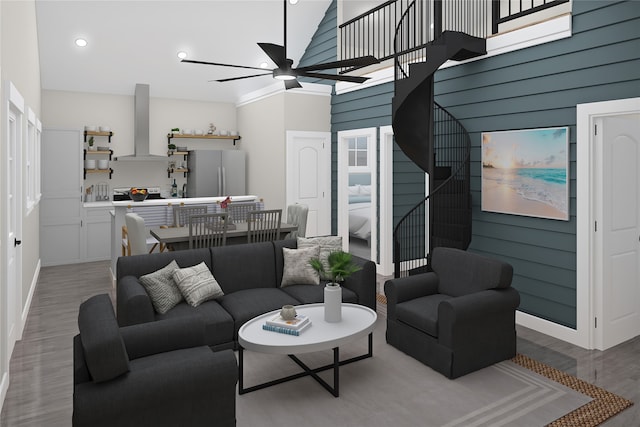 living room featuring a high ceiling, ceiling fan, and dark hardwood / wood-style flooring