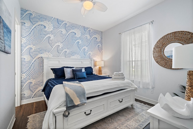 bedroom featuring dark hardwood / wood-style floors and ceiling fan