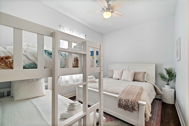 bedroom featuring dark hardwood / wood-style floors and ceiling fan