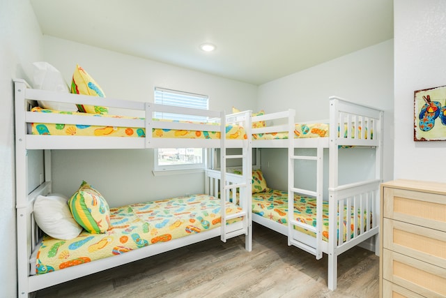 bedroom with light hardwood / wood-style floors