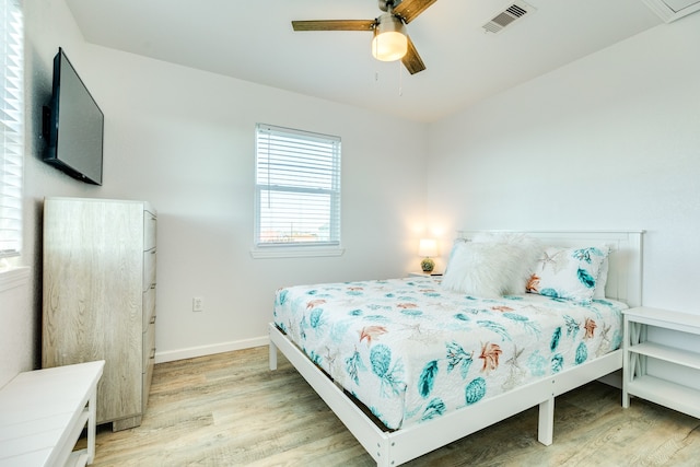 bedroom featuring ceiling fan and light wood-type flooring