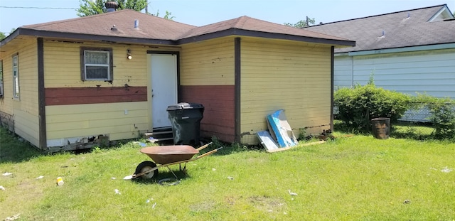 view of shed / structure featuring a yard