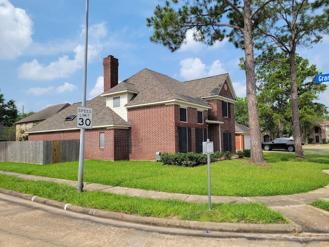 view of front of property with a front lawn