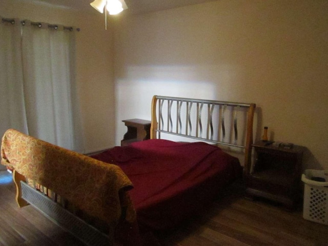 bedroom featuring wood-type flooring