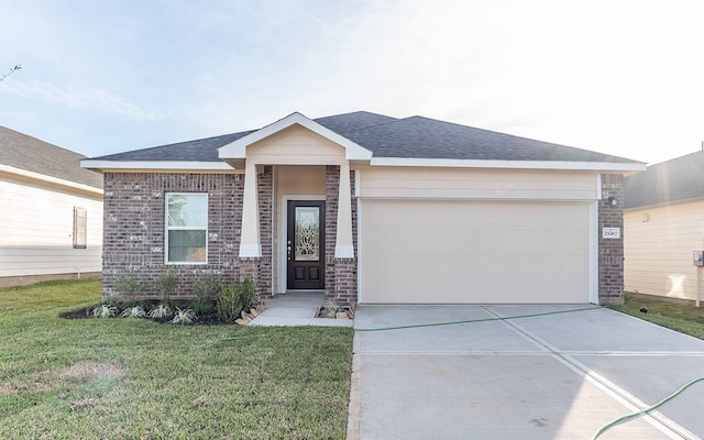 ranch-style home featuring a garage and a front lawn