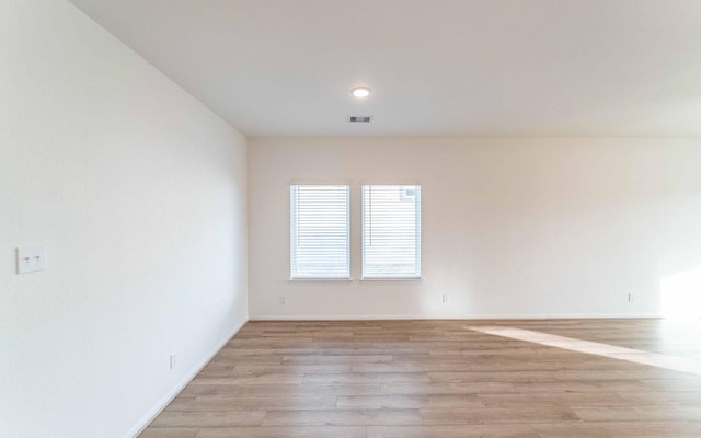 empty room featuring light hardwood / wood-style floors