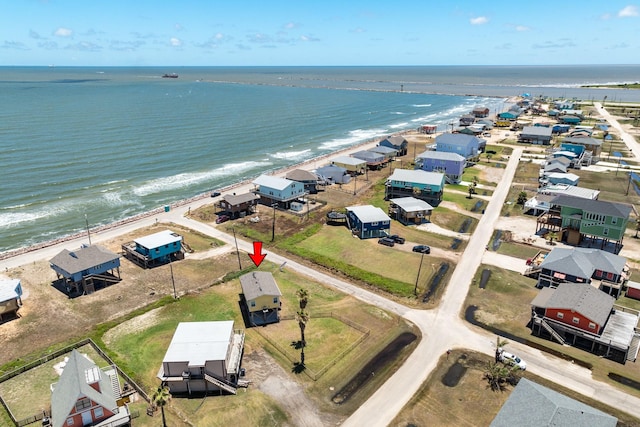 aerial view featuring a beach view and a water view