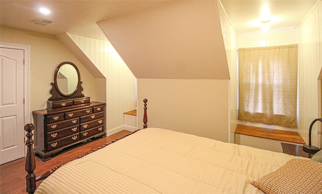 bedroom featuring dark hardwood / wood-style flooring