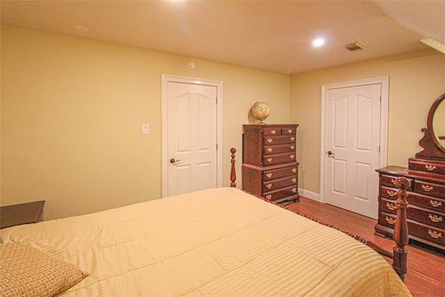 bedroom featuring wood-type flooring