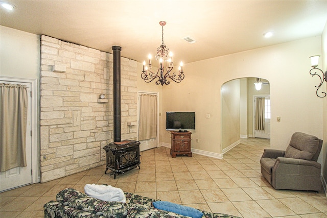 tiled living room featuring a wood stove