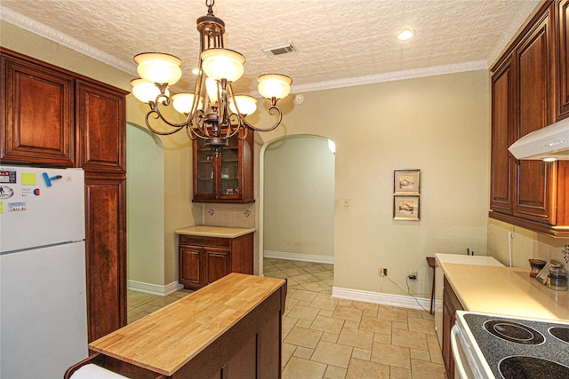 kitchen with butcher block countertops, electric range, white refrigerator, ornamental molding, and a chandelier