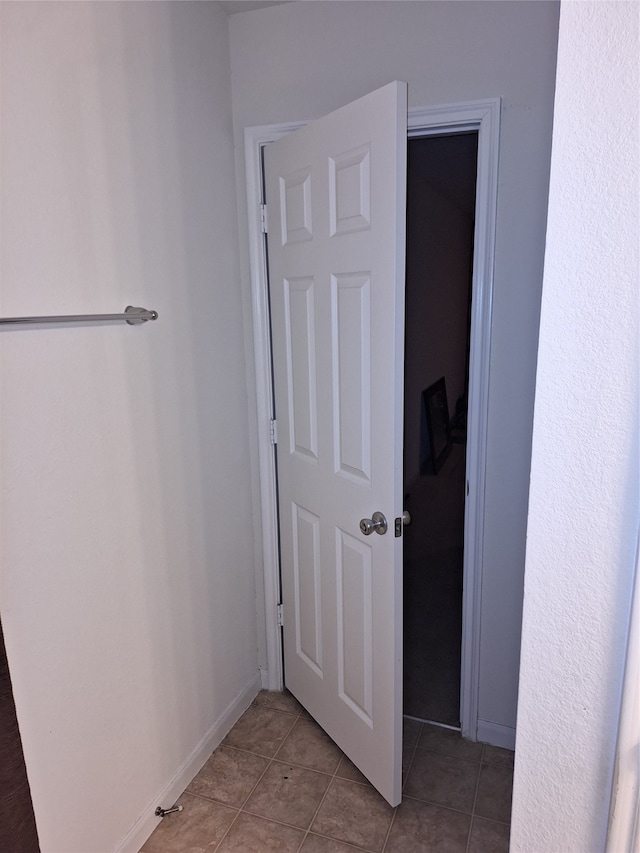 bathroom with tile flooring