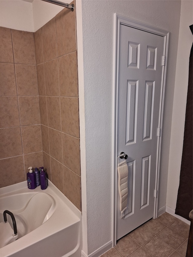 bathroom with tile flooring