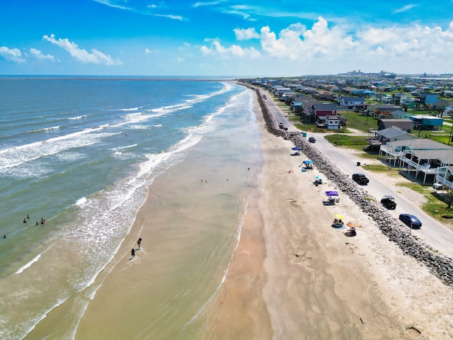 aerial view with a view of the beach and a water view