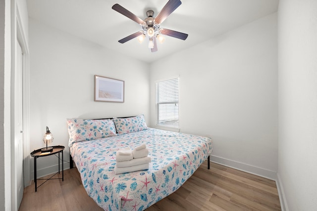 bedroom featuring ceiling fan and light wood-type flooring