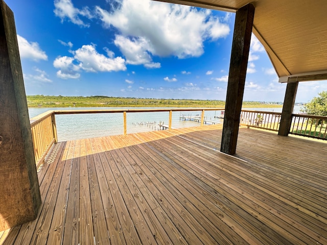 wooden terrace with a water view