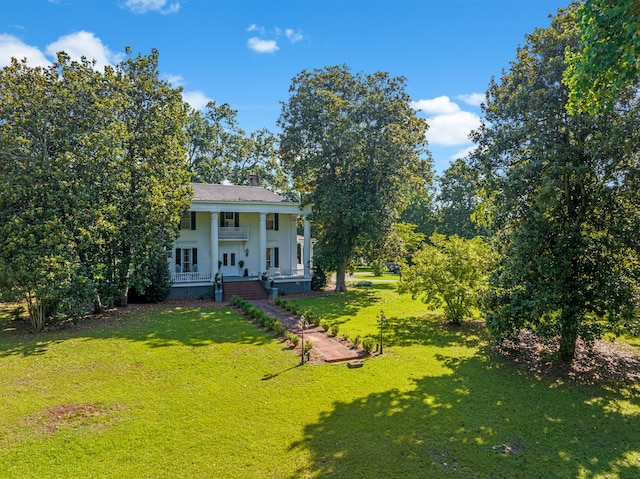 view of yard featuring french doors