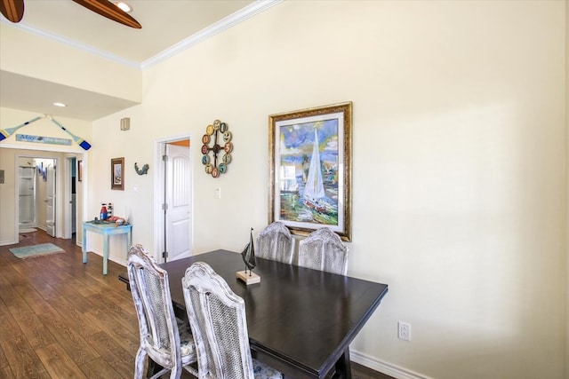 dining space with ceiling fan, crown molding, and dark hardwood / wood-style floors