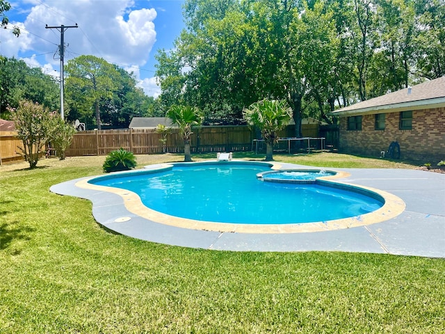 view of pool featuring a yard