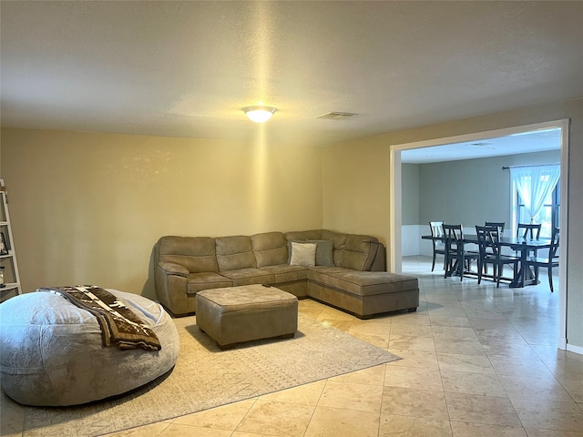 living room with light tile floors