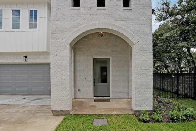 property entrance with a garage