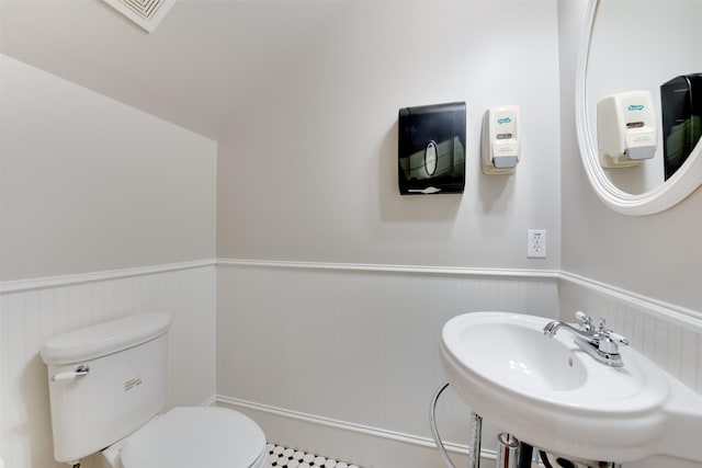 420 Heights Blvd, Houston, TX 77007 - half bathroom with a wainscoted wall and toilet