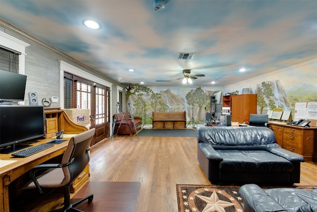 interior space featuring crown molding, light hardwood / wood-style floors, and ceiling fan