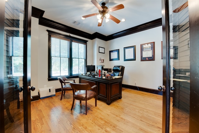 office space with crown molding, french doors, light hardwood / wood-style floors, and ceiling fan