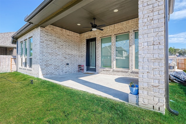 view of patio / terrace featuring ceiling fan