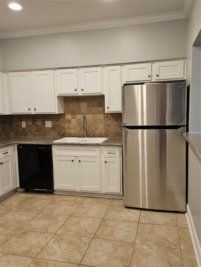 kitchen featuring white cabinetry, backsplash, sink, dishwasher, and stainless steel fridge