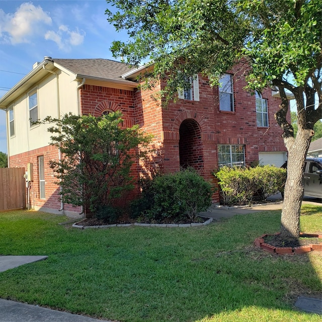 view of front of house with a front lawn