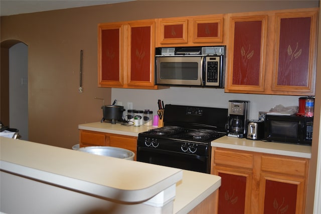 kitchen with black appliances