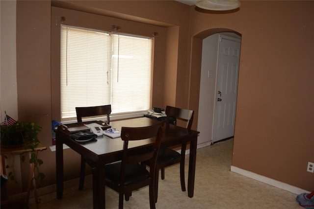 tiled dining area with plenty of natural light