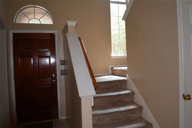 foyer entrance with a wealth of natural light