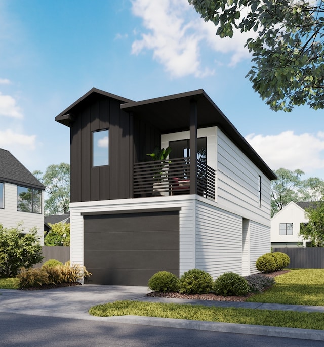 view of home's exterior featuring a balcony and a garage