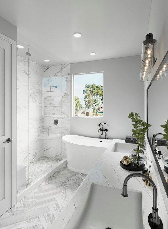 bathroom featuring separate shower and tub and double sink vanity