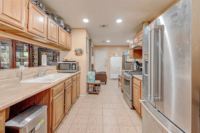7635 Loro Linda Dr, Houston, TX 77083 - kitchen featuring visible vents, a sink, recessed lighting, appliances with stainless steel finishes, and light countertops