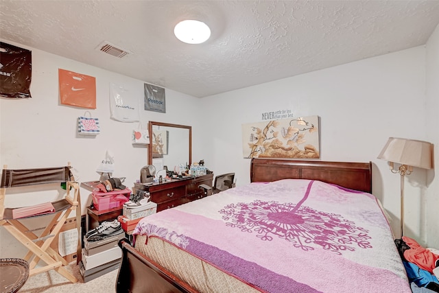 7635 Loro Linda Dr, Houston, TX 77083 - carpeted bedroom with visible vents and a textured ceiling