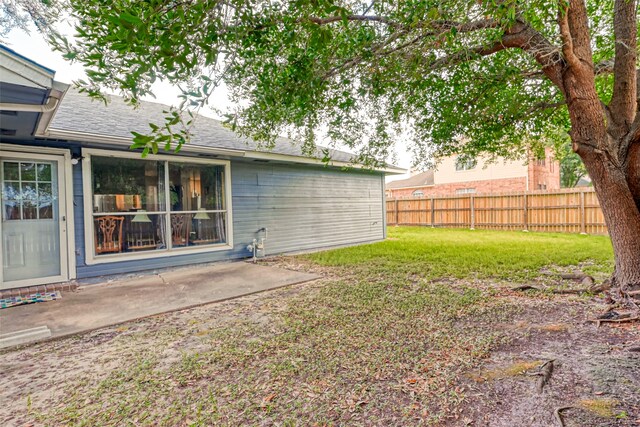 7635 Loro Linda Dr, Houston, TX 77083 - view of yard featuring a patio and fence